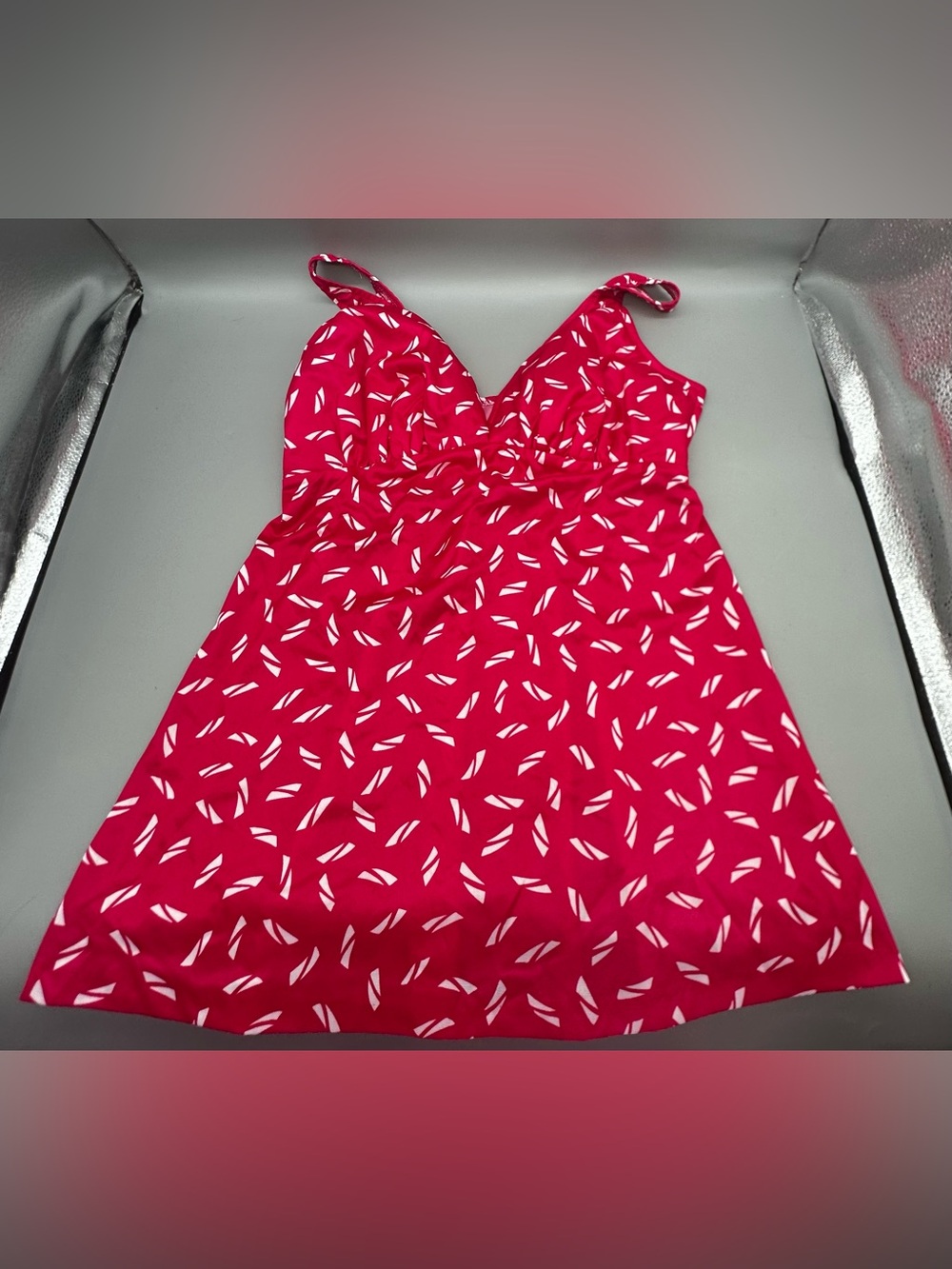 JC Penny pink and white abstract-patterned swim top